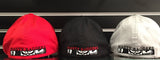Back view of three different-colored biker hats. 