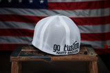 Back view of the Nasty Bagger Trucker Hat with an American Flag backdrop.