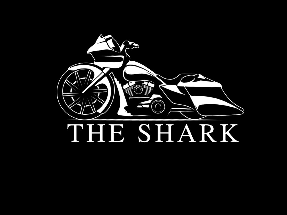 Logo with a motorcycle and the word “Shark” underneath it. 